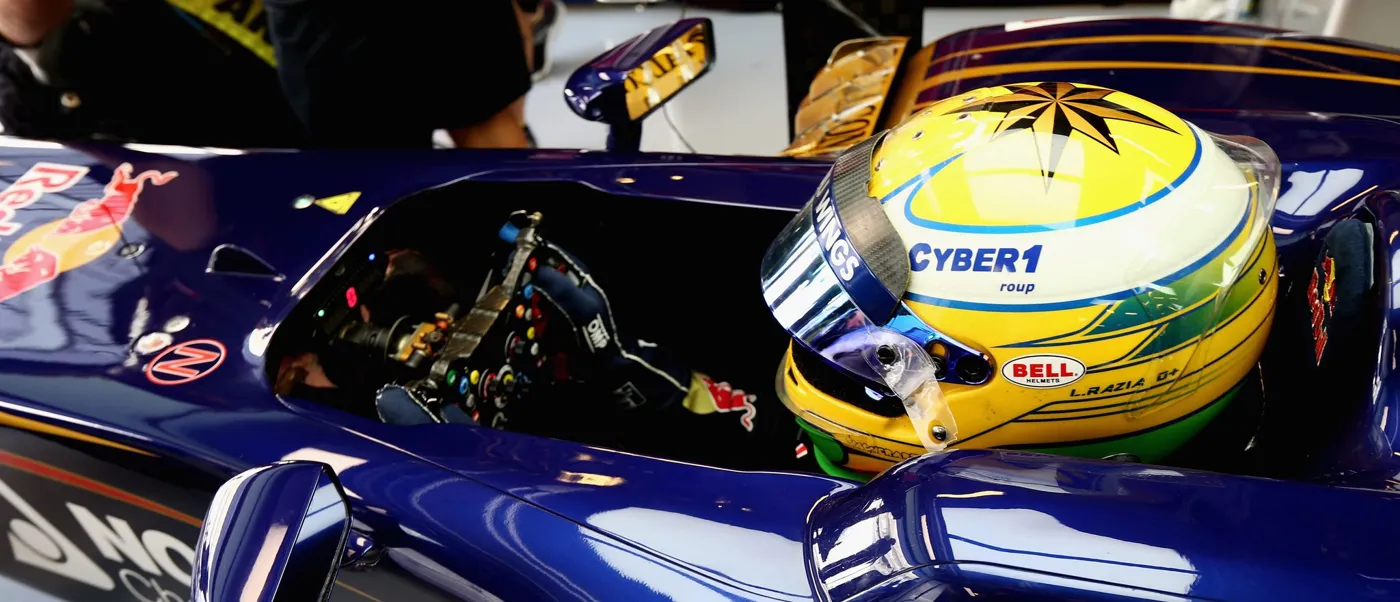 GP2 driver with the Cyber1 logo on his helmet
