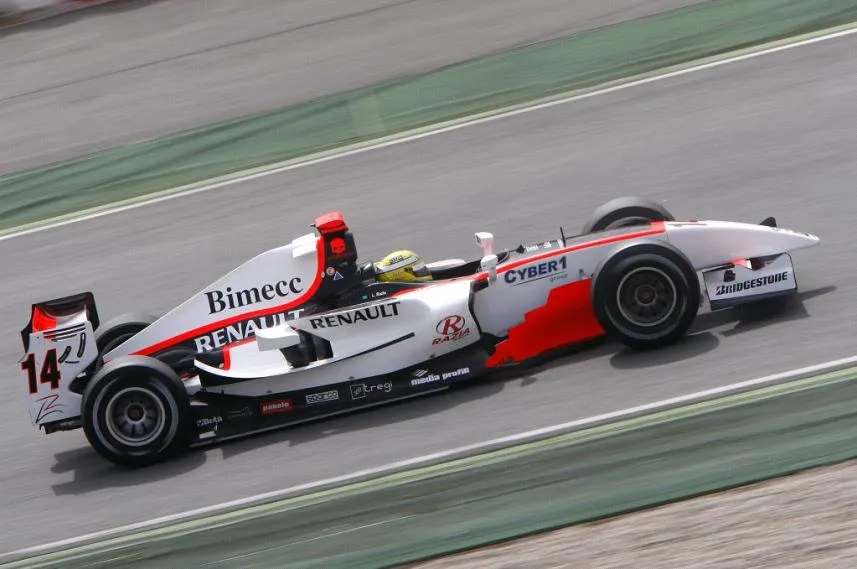 White GP2 car no. 14 with the Cyber1 logo, cornering