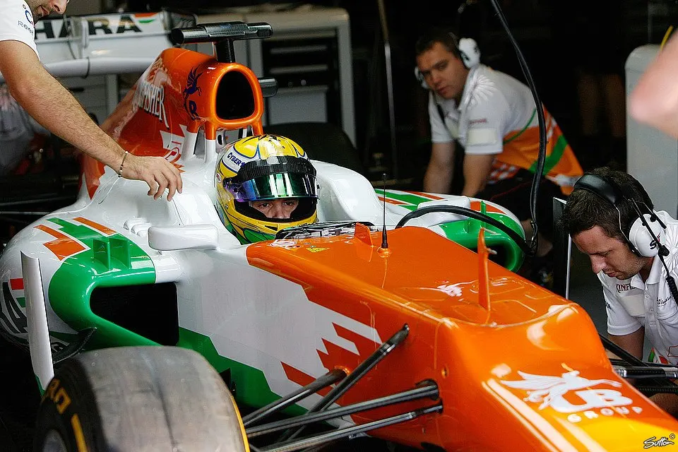 Driver seated in the car, in the garage