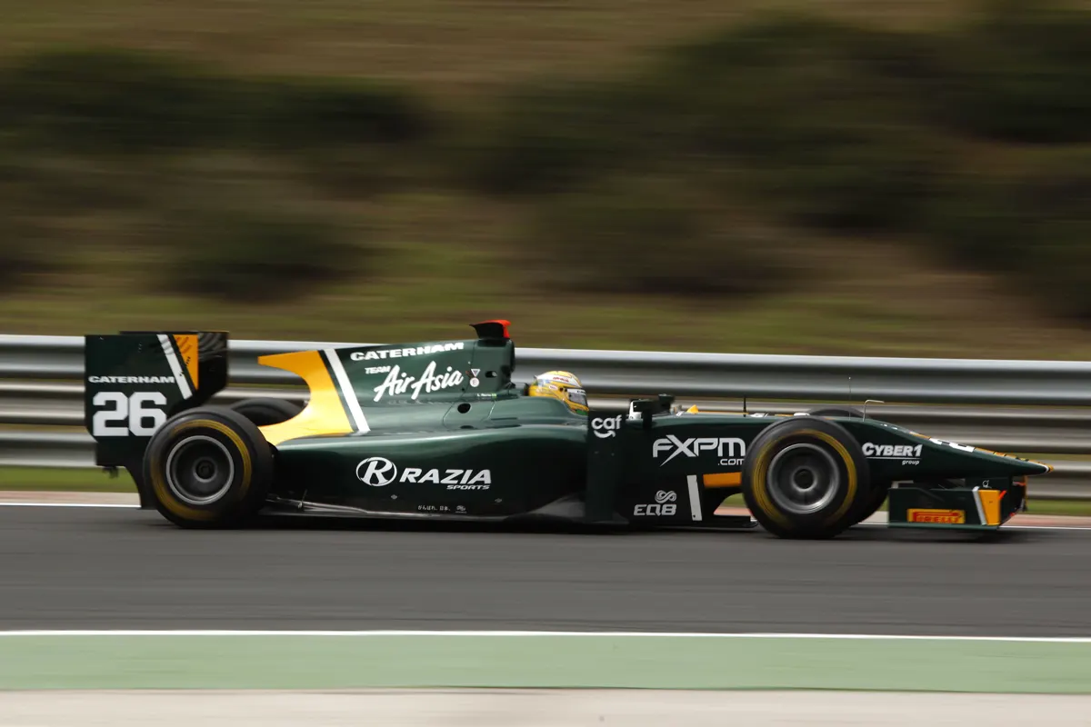 Green GP2 car on track